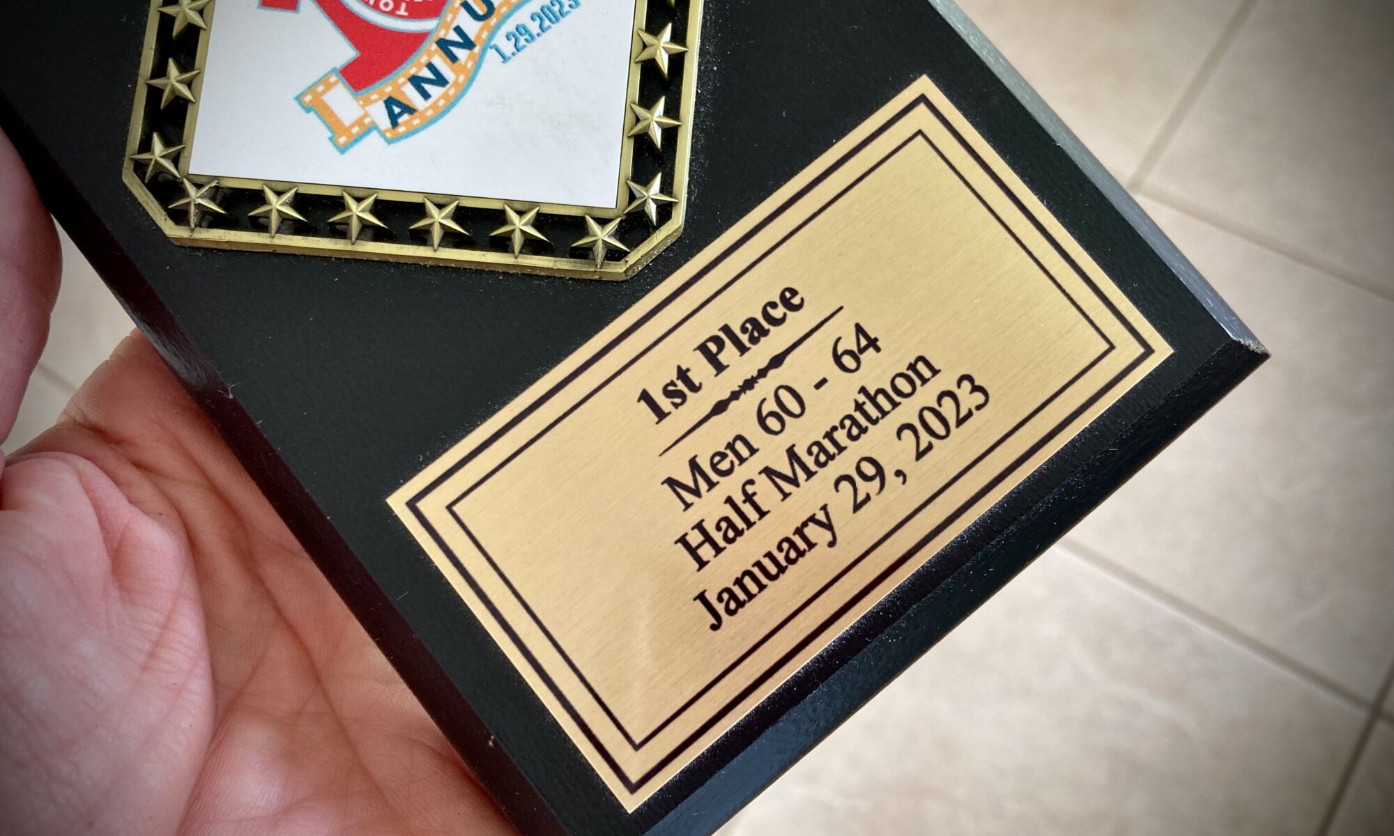 The author's half marathon age group award